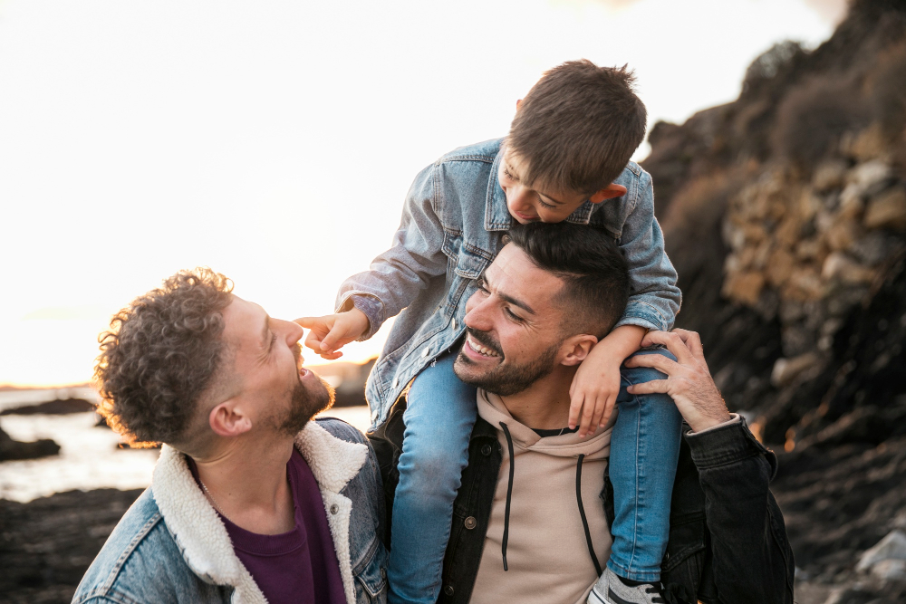 Same Sex Couple With Son Spending Time Together In Nature