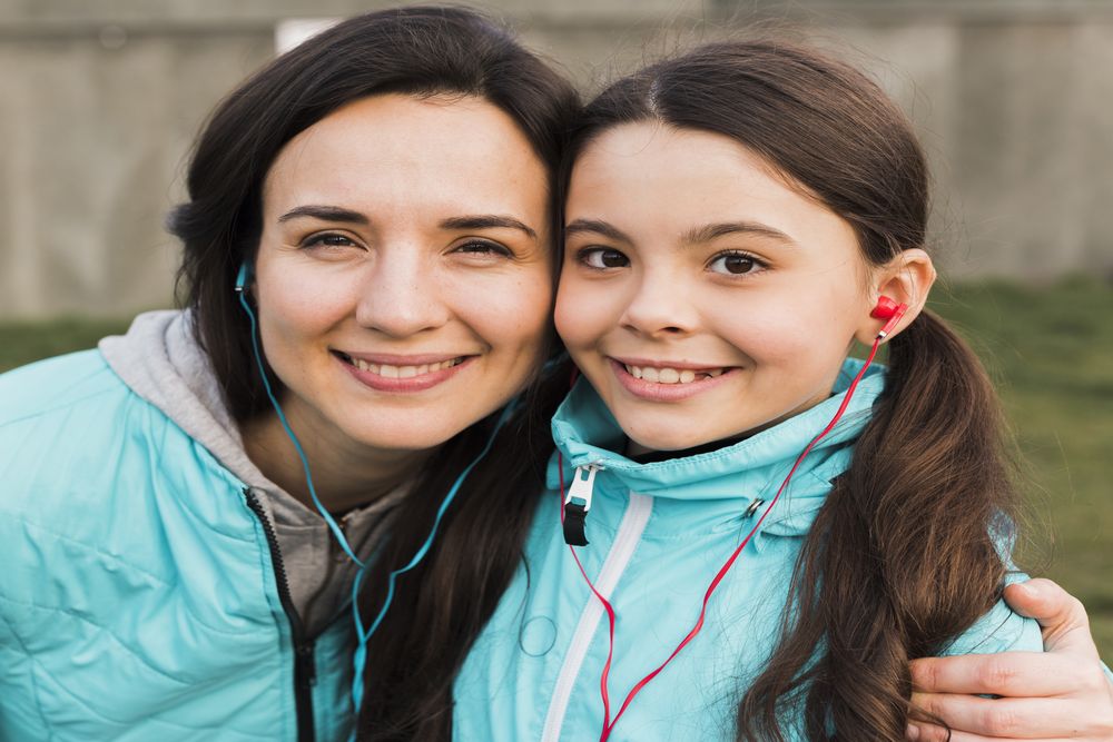 Mother And Daughter Wearing Sportswear