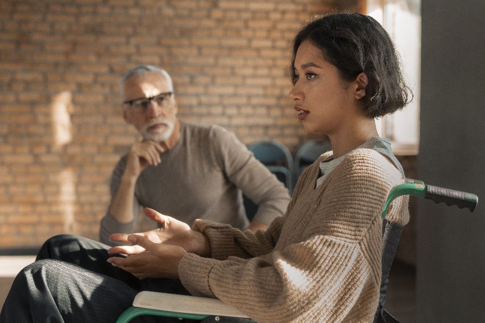 Psychologist Therapy Support At Group Meeting