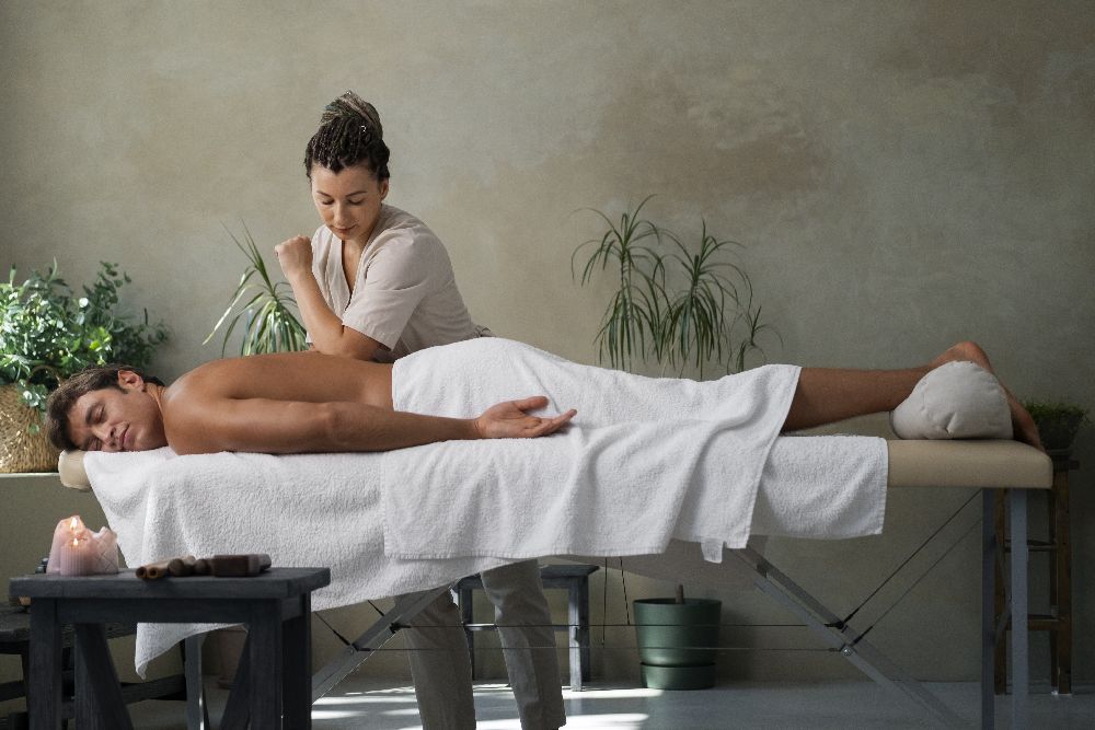 Registered Massage Therapist Working At Spa